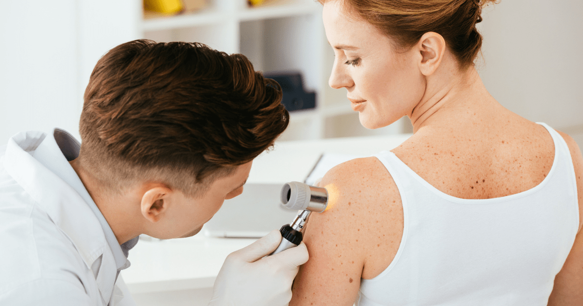 a girl getting a mole check